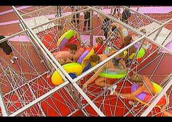 Double cross - teams wearing rubber rings have to get from one side of the bungee course to the other whilst meeting up in the middle with hilarious consequences.